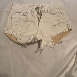 AE high rise festival distressed denim shorts